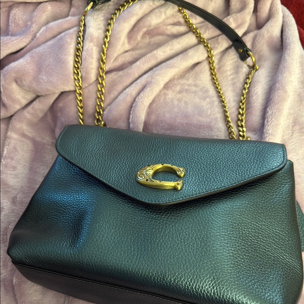 Elegant Black Leather Bag with Gold Chain